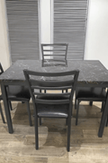 Black faux marble dining table with cushioned chairs – 5-piece set
Modern 7-piece faux marble dining set for home kitchen