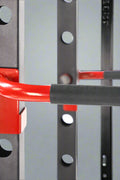 Heavy-duty gym power rack with LAT pulldown and weight plate storage
Squat cage with adjustable J-hooks and multi-grip pull-up bar
LAT pulldown attachment and cable system on power rack
Full side view of squat rack setup for home gym use
Rear view of power cage showing plate storage and cable attachment