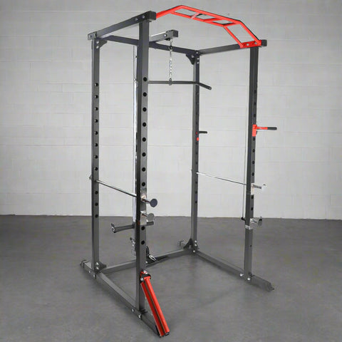 Heavy-duty gym power rack with LAT pulldown and weight plate storage
Squat cage with adjustable J-hooks and multi-grip pull-up bar
LAT pulldown attachment and cable system on power rack
Full side view of squat rack setup for home gym use
Rear view of power cage showing plate storage and cable attachment