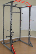 Heavy-duty gym power rack with LAT pulldown and weight plate storage
Squat cage with adjustable J-hooks and multi-grip pull-up bar
LAT pulldown attachment and cable system on power rack
Full side view of squat rack setup for home gym use
Rear view of power cage showing plate storage and cable attachment