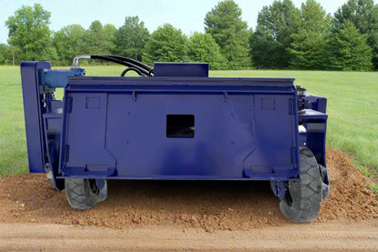 72" hydraulic soil conditioner attachment on a skid steer
Remote-controlled drum system with carbide teeth
Side view of skid steer soil conditioner in action
Soil prep tool for seedbeds and landscaping
Durable construction of 72-inch soil conditioner