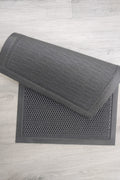 Heavy-duty 2x3 FT dirt catcher mat on light wood floor
Non-slip rubber backing for entry mat safety
Rolled-up doormat showing thickness and texture
Close-up of dirt-trapping texture on entry mat