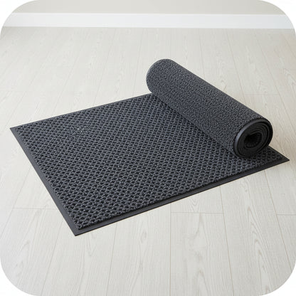 Heavy-duty 2x3 FT dirt catcher mat on light wood floor
Non-slip rubber backing for entry mat safety
Rolled-up doormat showing thickness and texture
Close-up of dirt-trapping texture on entry mat