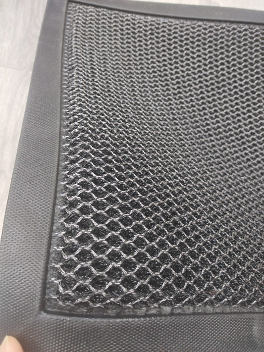 Heavy-duty 2x3 FT dirt catcher mat on light wood floor
Non-slip rubber backing for entry mat safety
Rolled-up doormat showing thickness and texture
Close-up of dirt-trapping texture on entry mat