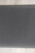 Heavy-duty 2x3 FT dirt catcher mat on light wood floor
Non-slip rubber backing for entry mat safety
Rolled-up doormat showing thickness and texture
Close-up of dirt-trapping texture on entry mat