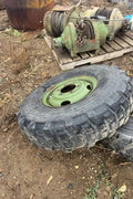 9.00R16 Michelin – Military Surplus Tire & Rim Assembly (Assorted Tread Patterns) - with Very Little Cracking if any | Sold by Uncle Wiener's Wholesale
