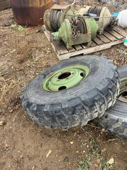 9.00R16 Michelin – Military Surplus Tire & Rim Assembly (Assorted Tread Patterns) - with Very Little Cracking if any | Sold by Uncle Wiener's Wholesale