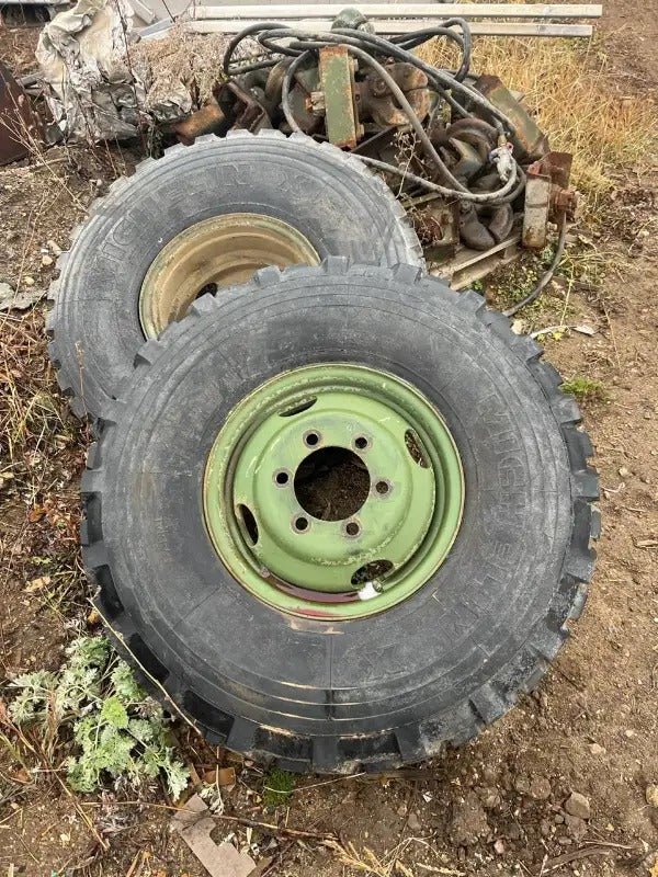 9.00R16 Michelin – Military Surplus Tire & Rim Assembly (Assorted Tread Patterns) - with Very Little Cracking if any | Sold by Uncle Wiener's Wholesale