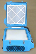 500 CFM HEPA air scrubber for industrial and restoration use
Blue air purifier with 3-stage filtration and duct ports
Portable HEPA air scrubber with handle and GFCI outlet
Side view of HEPA air scrubber with intake filter panel
Top control panel of air cleaner with variable speed settings