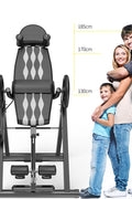 Folding inversion table for back pain relief and spinal decompression
Adjustable inversion table for home use and fitness therapy
Close-up of padded backrest and ankle support on inversion table
Foldable back stretcher in upright storage position
User on inversion table demonstrating full inversion angle
