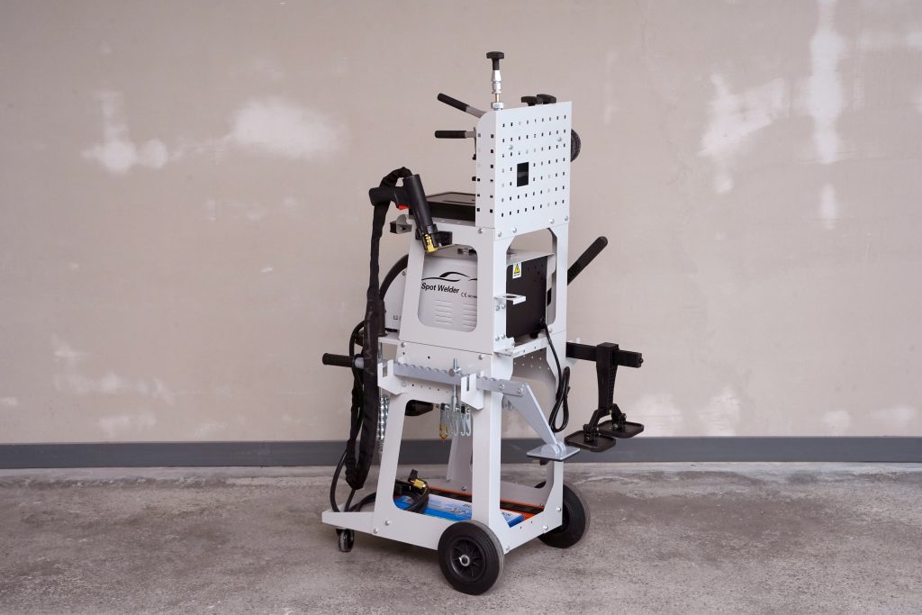 Auto Body Dent Repair Welding Machine F90ESS front view
F90ESS Spot Welder with 3800A output and accessories
Professional auto panel dent pulling machine with display
Tool selection options for F90ESS spot welder
Auto repair welding machine for body shops and garages