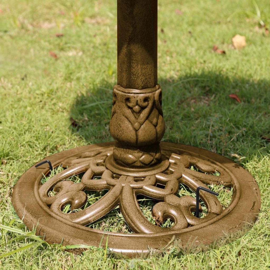 Antique copper polyresin bird bath with solar fountain

Top-down view of bird bath basin and solar pump

Decorative outdoor bird bath with stable pedestal base

Multiple fountain head options for water spray pattern

Garden setting with bird bath and solar-powered water feature