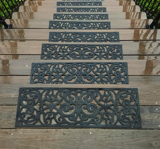 Black anti-slip rubber stair mats on outdoor steps
Close-up of grillwork pattern on rubber stair tread
Set of 4 durable black stair mats for front steps
Rubber stair mats for outdoor use in various settings
Easy-to-clean open design rubber stair treads