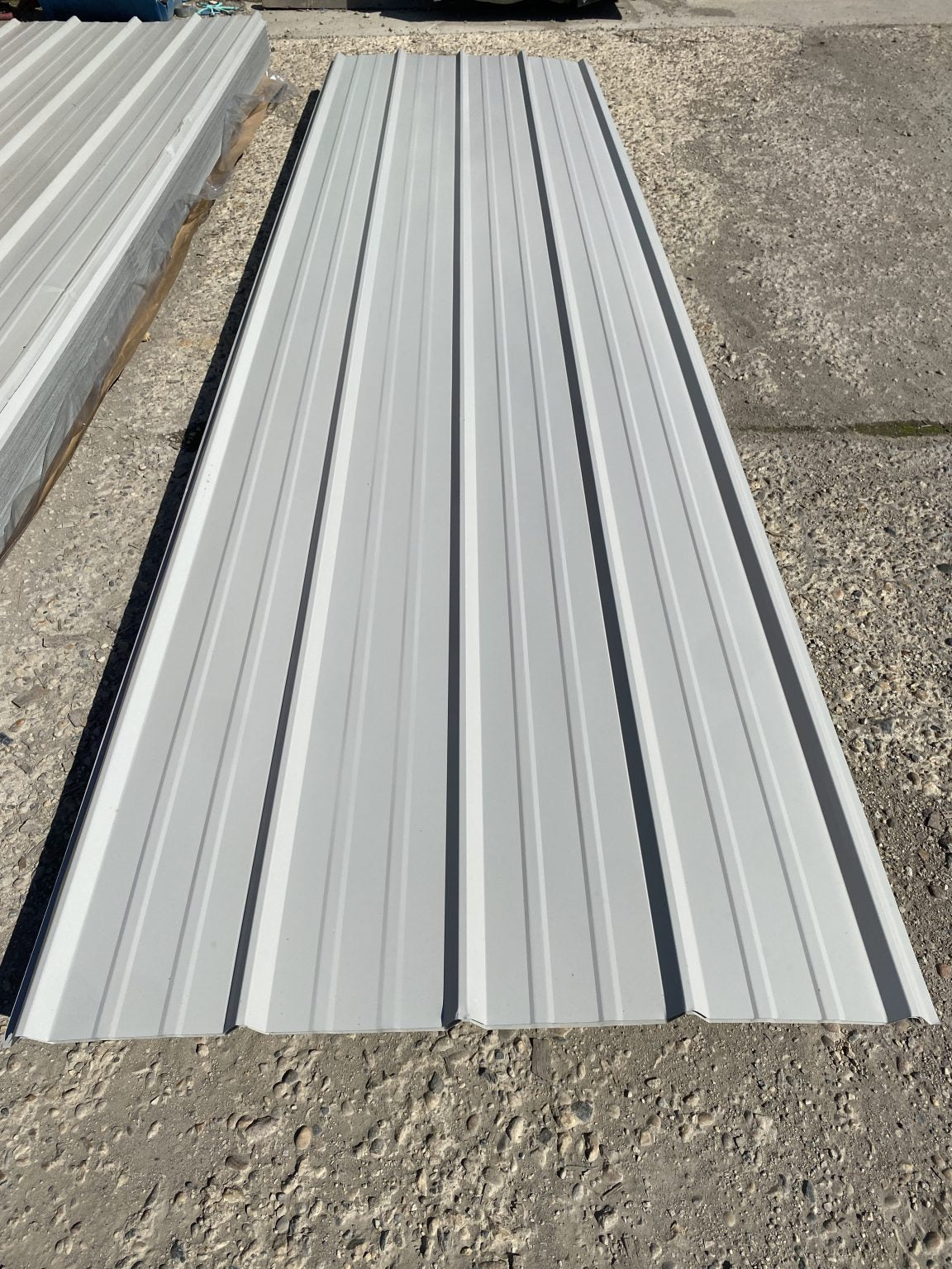 Steel Siding Panels – Charcoal Finish (Closeup)
Charcoal Gray Steel Siding Stack – Front View
White Metal Siding Panel – 26 Gauge
Side Profile of 16ft Steel Siding Panels
Black Finish Steel Siding – Color Sample
Steel Siding Color Swatches – Gray, White, Charcoal