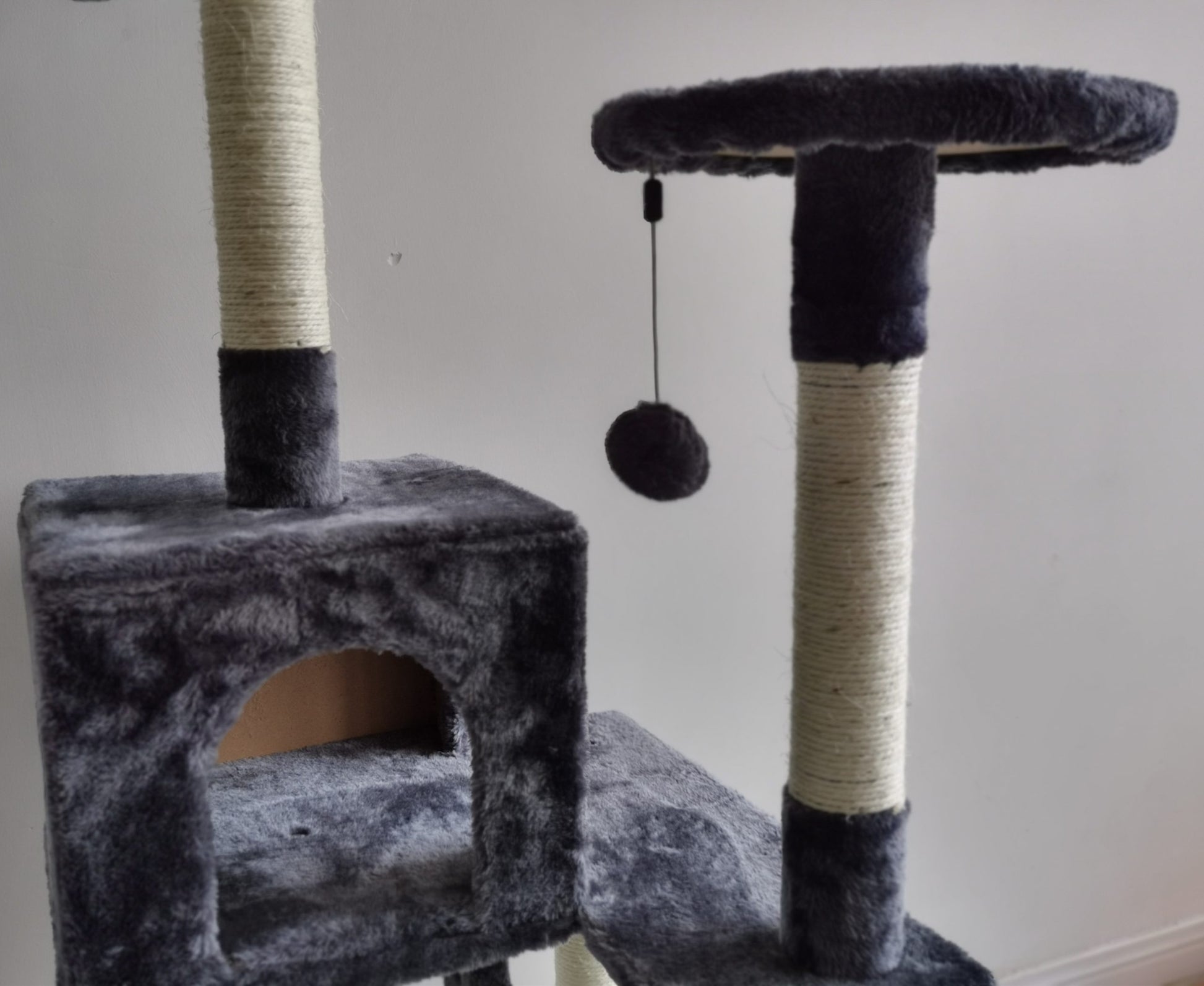 Gray multi-level cat tower with scratching posts and ladder
Cat climbing condo with enclosed space and jute posts
Sturdy XL cat tree furniture for multiple cats
Indoor cat activity tower with neutral color
Durable cat tower with platforms and hideout