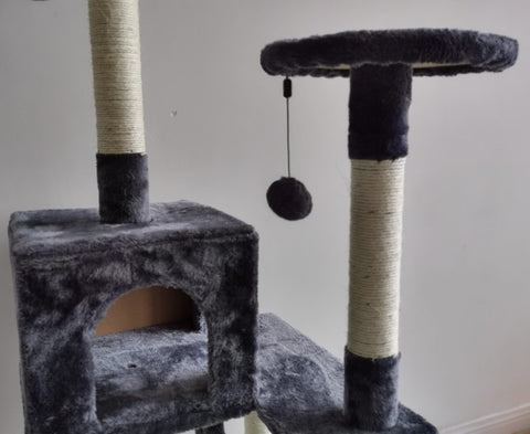 Gray multi-level cat tower with scratching posts and ladder
Cat climbing condo with enclosed space and jute posts
Sturdy XL cat tree furniture for multiple cats
Indoor cat activity tower with neutral color
Durable cat tower with platforms and hideout