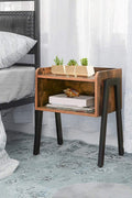 Stackable rustic wood and metal nightstand in bedroom
Industrial bedside table with black metal legs
Dual-tier MDF nightstand in modern space
Wooden nightstand stacked for storage
Compact rustic nightstand for small room