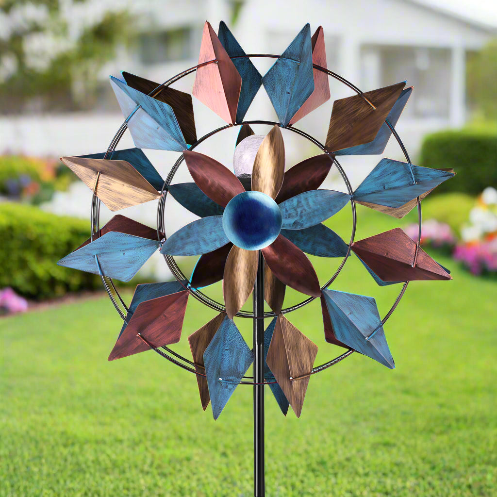 Solar metal wind spinner with LED light glowing in garden
Dual-blade kinetic wind spinner for patio and flower bed
Decorative garden stake spinner with stable base
Solar-powered wind spinner during daytime
Outdoor spinner LED kinetic sculpture