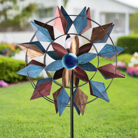Solar metal wind spinner with LED light glowing in garden
Dual-blade kinetic wind spinner for patio and flower bed
Decorative garden stake spinner with stable base
Solar-powered wind spinner during daytime
Outdoor spinner LED kinetic sculpture