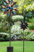 Solar metal wind spinner with LED light glowing in garden
Dual-blade kinetic wind spinner for patio and flower bed
Decorative garden stake spinner with stable base
Solar-powered wind spinner during daytime
Outdoor spinner LED kinetic sculpture