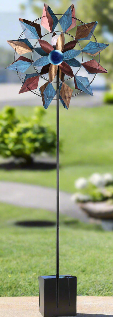 Solar metal wind spinner with LED light glowing in garden
Dual-blade kinetic wind spinner for patio and flower bed
Decorative garden stake spinner with stable base
Solar-powered wind spinner during daytime
Outdoor spinner LED kinetic sculpture