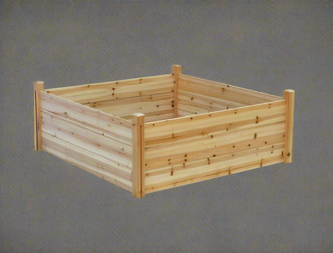 Raised wooden planter box 48x48x19 inches

Assembled garden bed in outdoor setup

Elevated wooden raised bed with soil

Planter box filled with vegetables

Easy slide-in dovetail joint design
