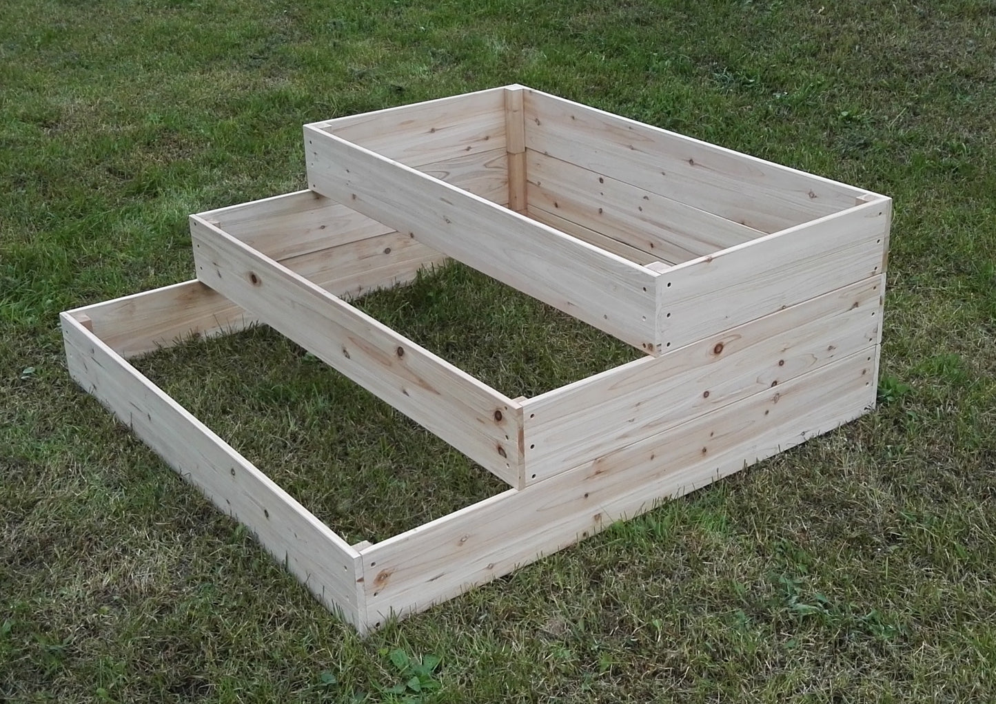 3-tier wooden raised garden bed on lawn
Step-style cedar planter box for vegetables and herbs
Easy-to-assemble elevated garden bed with tiered design

Outdoor wooden planter with 3 levels for home gardening
Spacious planter box for backyard flower and herb gardens
Durable raised bed for patio vegetable planting