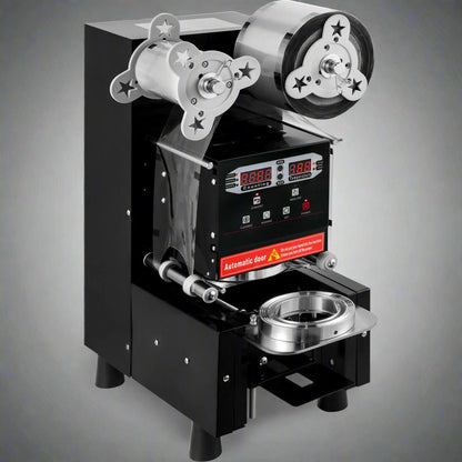 Commercial automatic bubble tea cup sealer front view

Side view of AC-powered boba cup sealing machine

Fully assembled sealing machine with control panel

Cup sealing process in progress

Commercial tea shop setup with sealing machine
