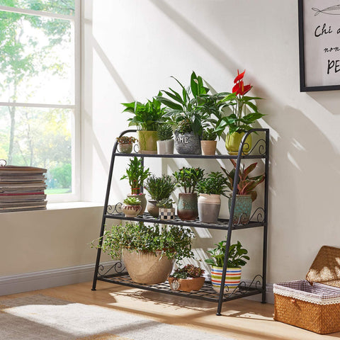 3-tier metal plant stand with potted plants in living room
Black powder-coated plant rack used indoors
Metal flower shelf displayed on outdoor patio
Sturdy decorative stand with three storage tiers
Compact garden shelf holding flowers and décor items
Close-up of black metal frame and assembly