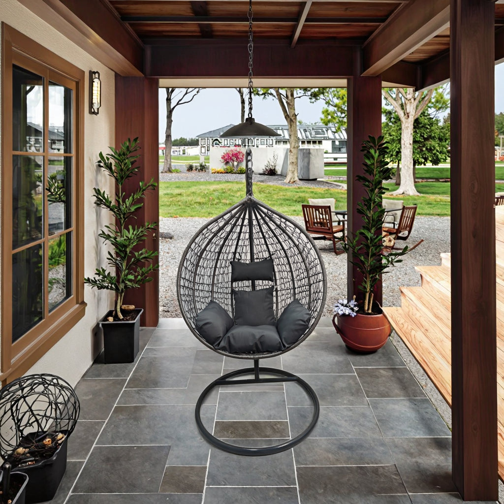 Egg Chair Swing on Patio with Gray Cushion

Hanging Egg Chair with Stand – Outdoor Setup

Egg Chair Basket Frame Close-Up

Dark Gray Cushion Detail

Indoor Setup of Egg Hammock Chair