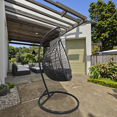 Egg Chair Swing on Patio with Gray Cushion

Hanging Egg Chair with Stand – Outdoor Setup

Egg Chair Basket Frame Close-Up

Dark Gray Cushion Detail

Indoor Setup of Egg Hammock Chair
