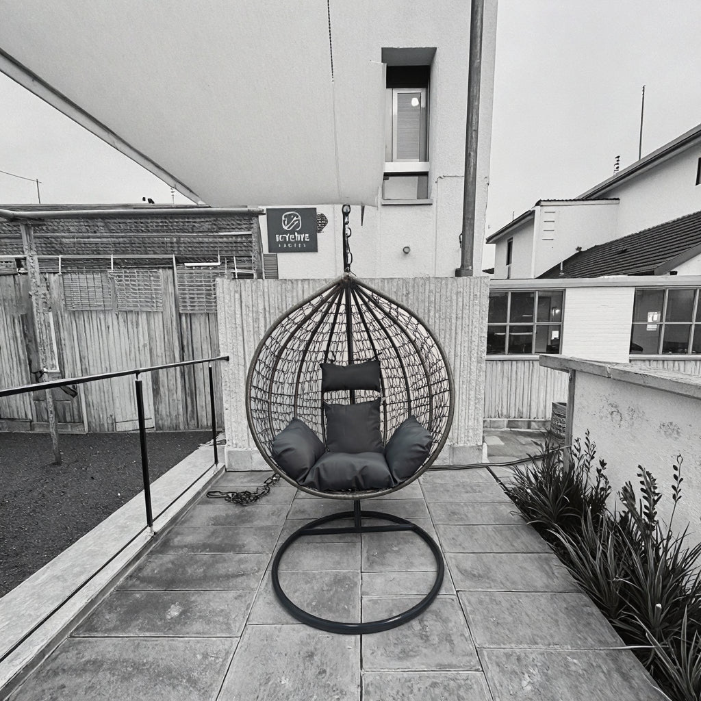 Egg Chair Swing on Patio with Gray Cushion

Hanging Egg Chair with Stand – Outdoor Setup

Egg Chair Basket Frame Close-Up

Dark Gray Cushion Detail

Indoor Setup of Egg Hammock Chair