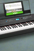 “Alesis Recital Pro 88-key digital piano front view”

“Alesis piano with built-in speakers and full-size weighted keys”

“88-key hammer action electric piano for beginners and pros”

“Rear panel of Alesis Recital Pro showing inputs and outputs”

“Close-up of control panel and FX buttons on Alesis keyboard”