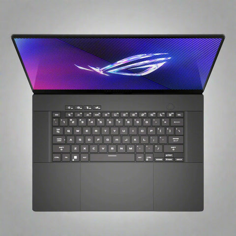 ASUS ROG Zephyrus G16 Laptop with RGB keyboard and OLED screen
Side profile of Zephyrus G16 showcasing slim build
Rear ventilation and ASUS ROG logo on lid