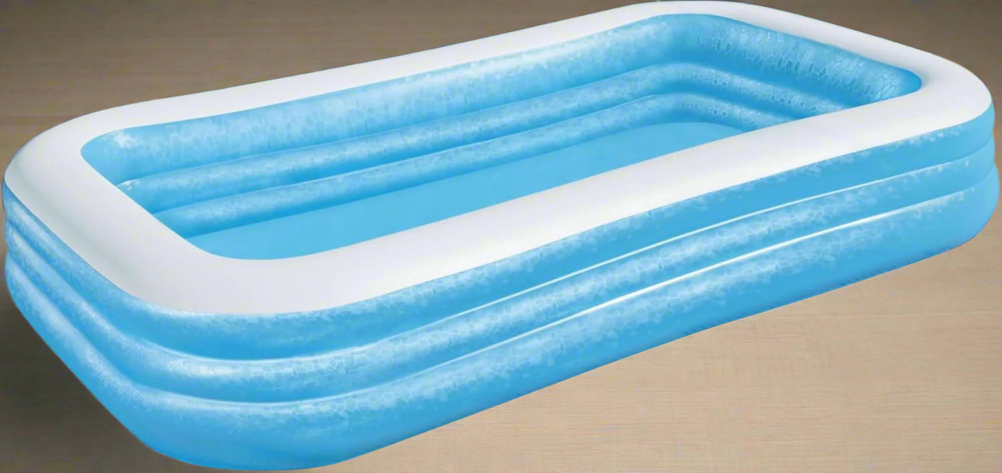 Bestway inflatable rectangular paddling pool with family inside

Top-down view of Bestway blue inflatable pool

Inflatable pool on grass with children playing

Side angle of Bestway pool showing two air chambers

Dimensions of Bestway family pool

Family enjoying inflatable pool in the backyard

Rectangular Bestway paddling pool setup outdoors