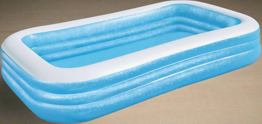 Bestway inflatable rectangular paddling pool with family inside

Top-down view of Bestway blue inflatable pool

Inflatable pool on grass with children playing

Side angle of Bestway pool showing two air chambers

Dimensions of Bestway family pool

Family enjoying inflatable pool in the backyard

Rectangular Bestway paddling pool setup outdoors