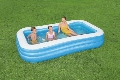 Bestway inflatable rectangular paddling pool with family inside

Top-down view of Bestway blue inflatable pool

Inflatable pool on grass with children playing

Side angle of Bestway pool showing two air chambers

Dimensions of Bestway family pool

Family enjoying inflatable pool in the backyard

Rectangular Bestway paddling pool setup outdoors