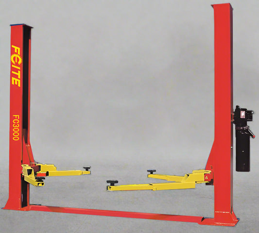 Blue Viper FC3000 car lift with 10,000 lb capacity front view
Red and black 2-post automotive hydraulic lift with 220V motor
Clear-floor symmetrical car lift hoist for garage use