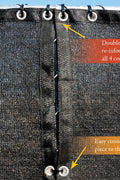 Closeup of reinforced hemmed edge with rust-resistant grommets on fence screen