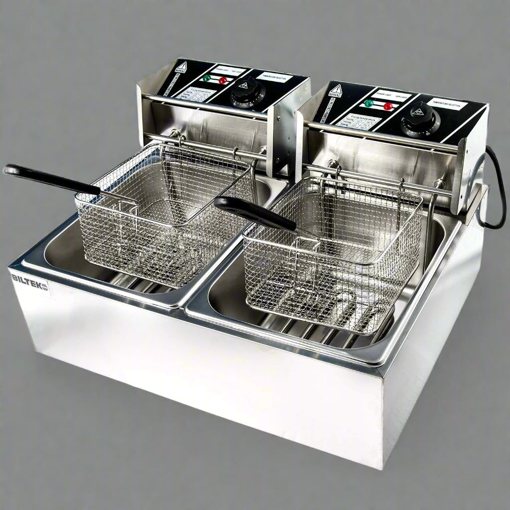 Double tank stainless steel commercial deep fryer with baskets
Single tank electric deep fryer for restaurant use
Stainless steel fryer with fries in basket
Compact 6L fryer for countertop kitchens
Commercial kitchen deep frying setup with accessories