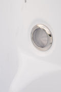 Close-up of hydrotherapy jets system in small spa tub