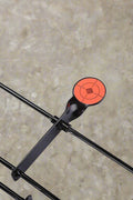 Angled view of steel shooting spinner with powder-coated paddles