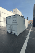 Gray 7FT steel office container with side door and windows
Interior view of 12FT jobsite office sea container
Office container unit with swing door and locking system
Plywood flooring inside portable office container
Security window with locking bar on steel sea container