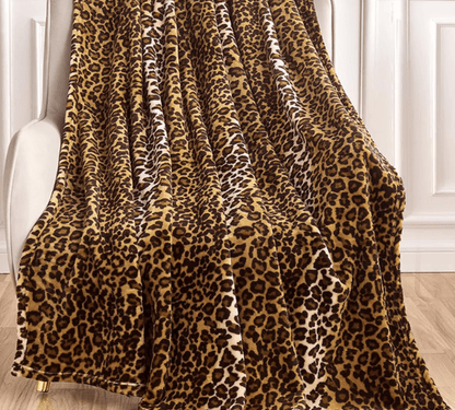 Cow & Leopard Print Faux Fur Throw Blankets and Decorative Pillows – Soft Home Décor - with Leopard Print Throw Blanket – 50″ × 60″ | Sold by Uncle Wiener's Wholesale