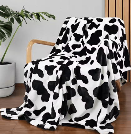 Cow & Leopard Print Faux Fur Throw Blankets and Decorative Pillows – Soft Home Décor - with Cow Print Throw Blanket – 50″ × 60″ | Sold by Uncle Wiener's Wholesale