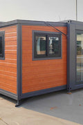 Deluxe Prefabricated Folding House – 2 Bedrooms, Kitchen, Electric Setup, Model: 0206DLX - with Roof Kit With Porch | Sold by Uncle Wiener's Wholesale