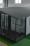 Exterior view of 2-bedroom deluxe folding house

Modern prefabricated orange modular home

Inside view of compact folding prefab unit

Kitchen area with electric setup in prefab home

Folding house with porch roof kit variant