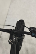 Deviant 20-inch fat tire off-road bike on the beach

Side view of 7-speed fat tire bike with disc brakes

Shimano derailleur on Deviant fat tire bike

Close-up of front disc brake and suspension fork

All-season fat tire bike on snow and gravel terrain