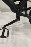 Deviant 20-inch fat tire off-road bike on the beach

Side view of 7-speed fat tire bike with disc brakes

Shimano derailleur on Deviant fat tire bike

Close-up of front disc brake and suspension fork

All-season fat tire bike on snow and gravel terrain