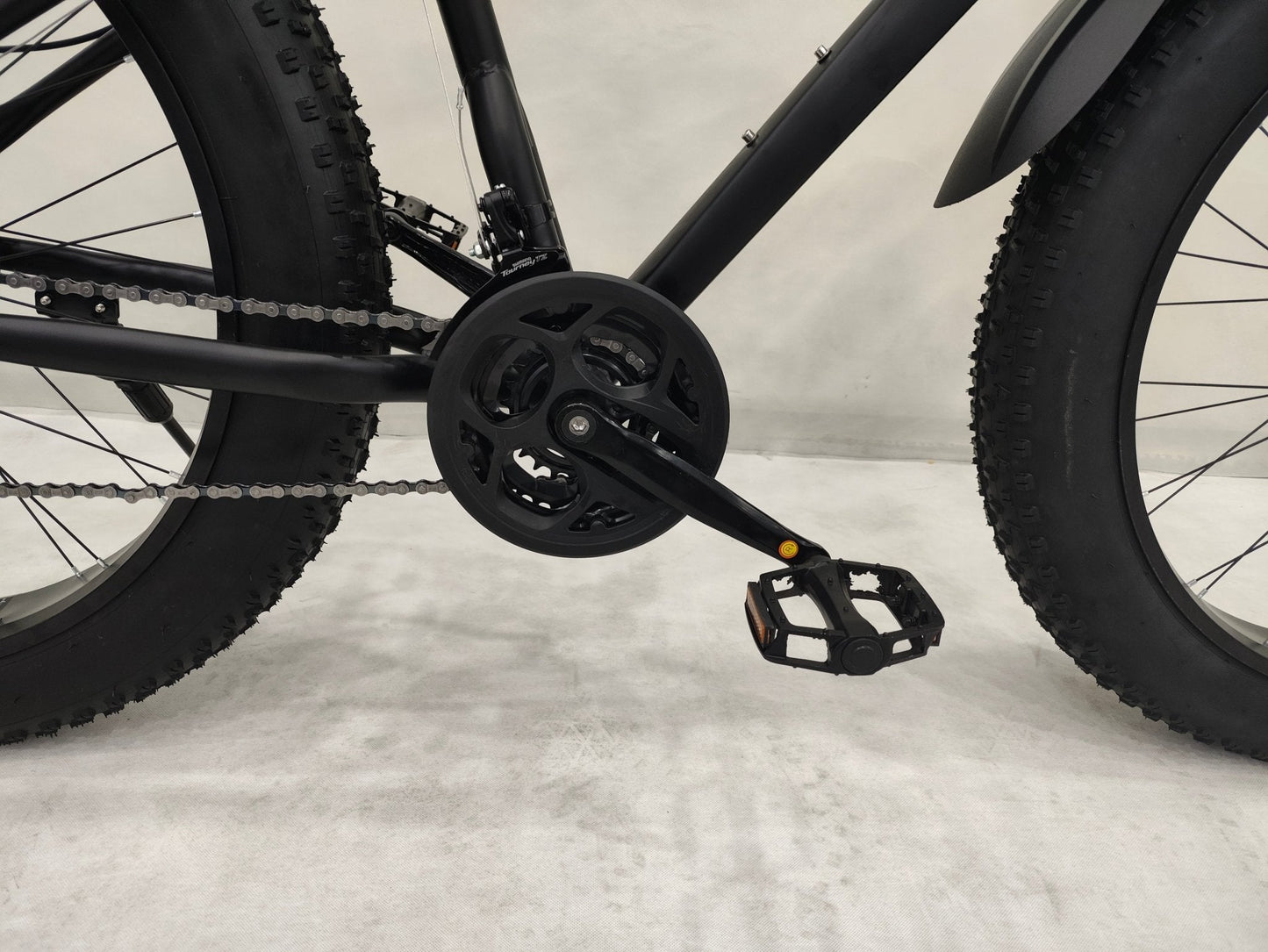 Deviant 26 inch fat tire bike side view on beach
Close-up of Shimano gear and disc brakes
All-terrain mountain bike with wide tires
Fat bike for snow, sand, and trails - Deviant 26 inch